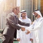 dubai-business-men-shaking-hands-scaled